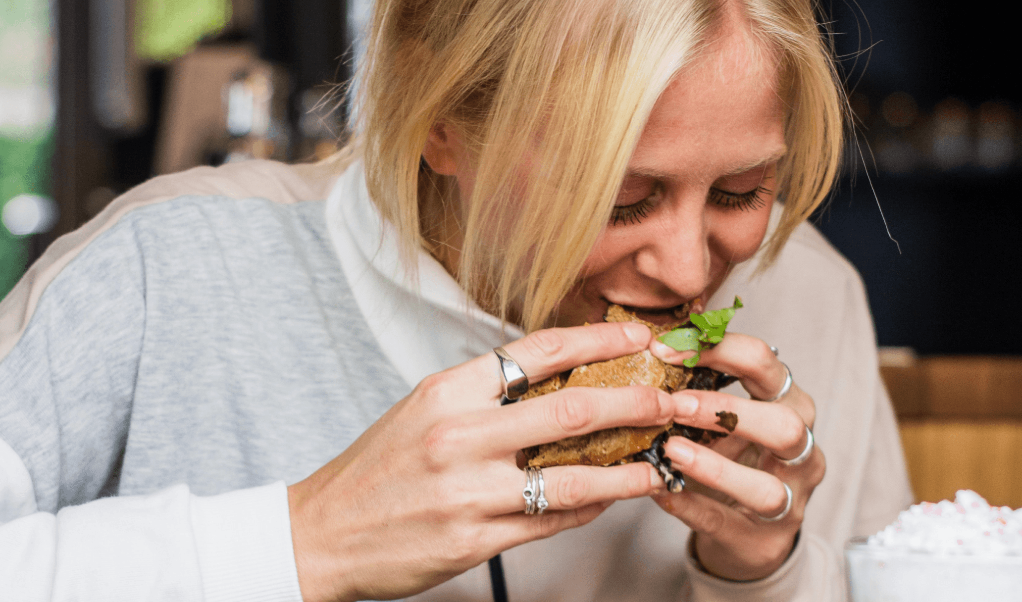 The woman eats a lot of junk food