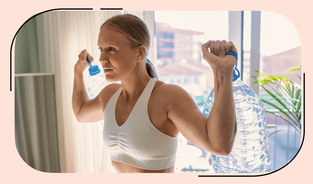 Woman performs at-home back workout with bottles